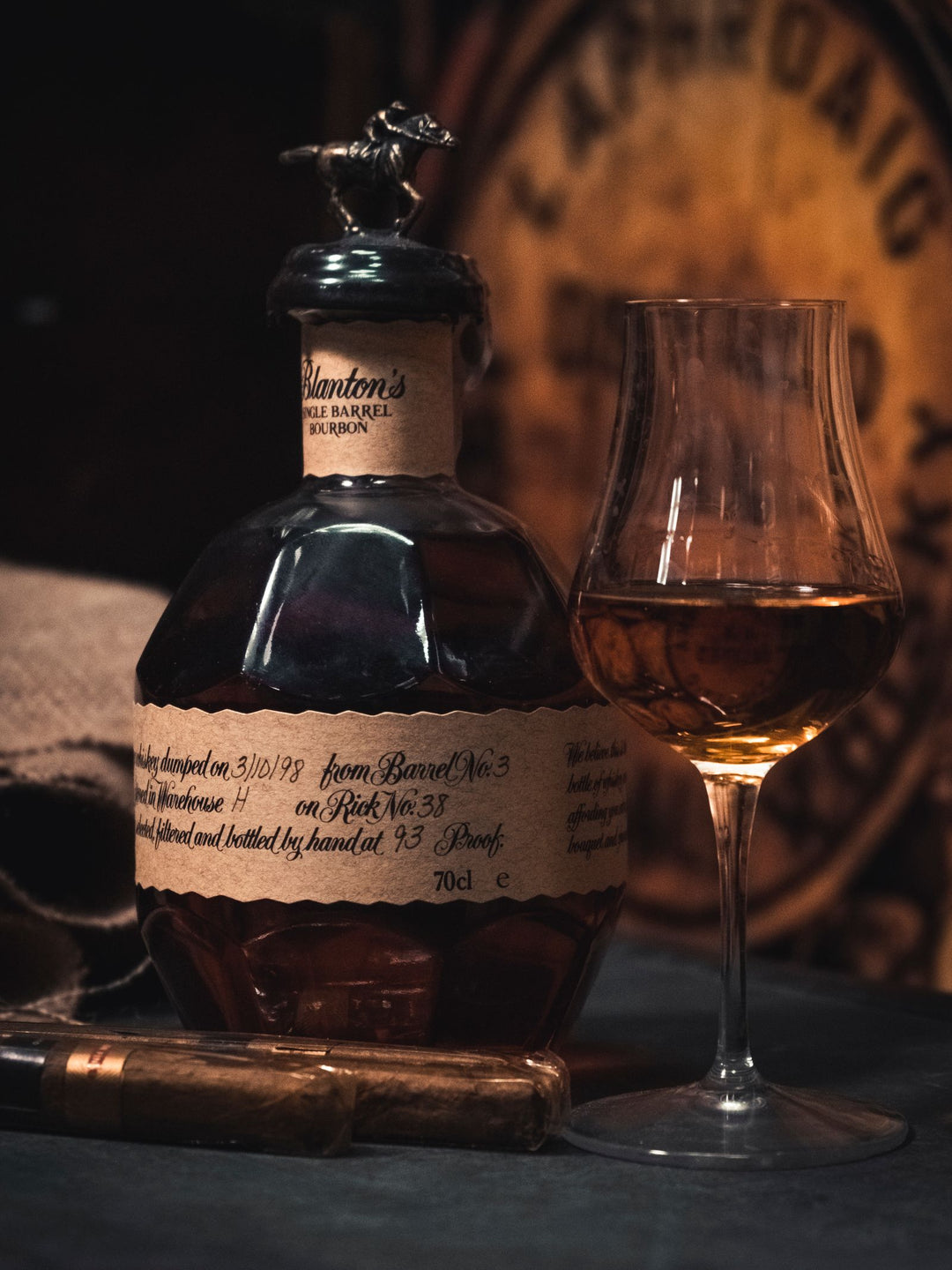 Bottle of bourbon whiskey with a glass